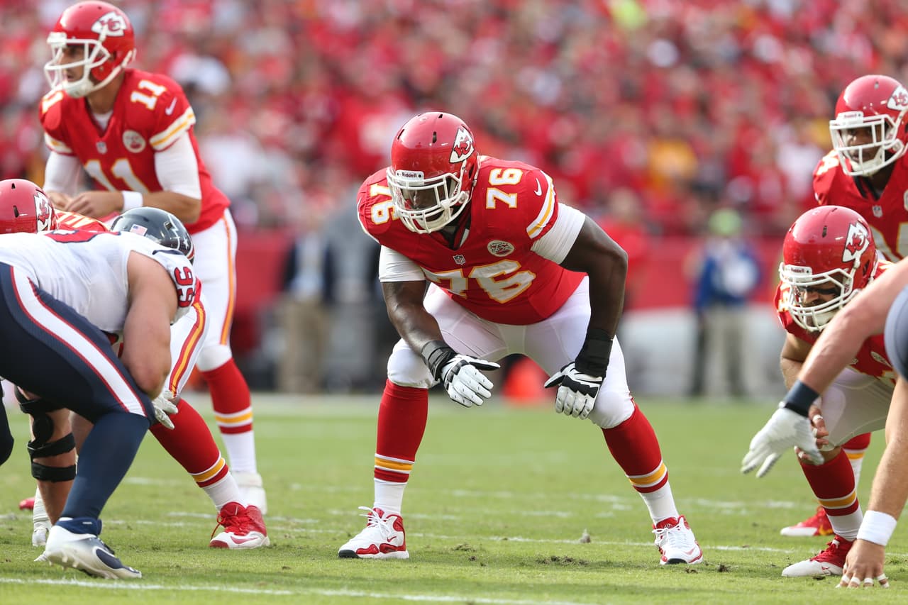 Kansas City Chiefs tackle Branden Albert (76) in stance during an NFL football game between the Kansas City Chiefs and the Houston Texans in Kansas City, MO Sunday, October 20, 2013. (AP Photo/Tom Hauck)