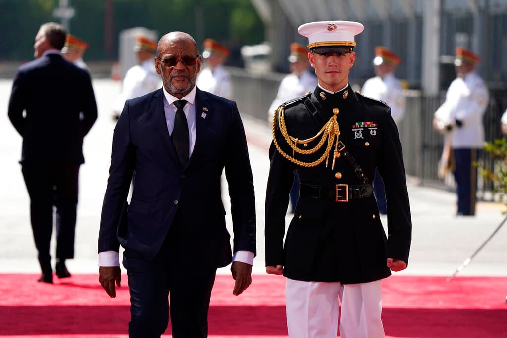 Ariel Henry, Prime Minister of the Republic of Haiti, left, arrives for the opening ceremony of the Summit of the Americas, Wednesday, June 8, 2022, in Los Angeles.