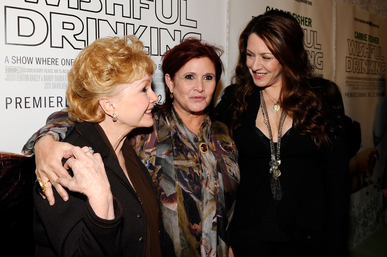 HOLLYWOOD, CA - DECEMBER 07: Actresses Debbie Reynolds, Carrie Fisher and Joely Fisher arrive at the premiere of the HBO documentary "Wishful Drinking" at Linwood Dunn Theater at the Pickford Center for Motion Study on December 7, 2010 in Hollywood, California. (Photo by Kevork Djansezian/Getty Images)