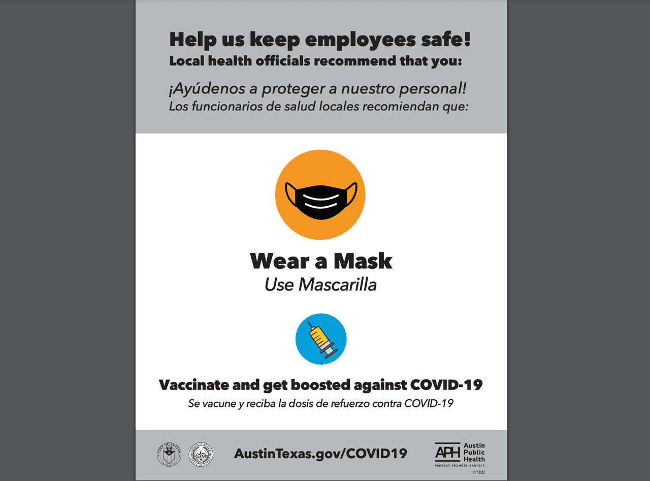 Otro de los carteles pide a las personas usar mascarillas.