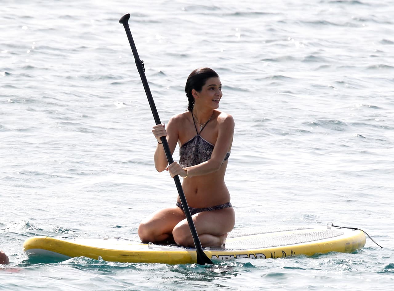 Kendall solita remando.