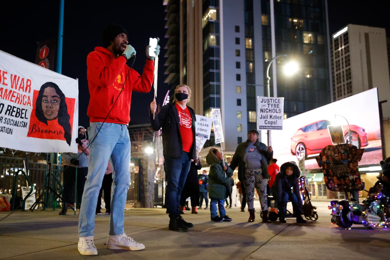 Demonstrators gather during a protest over the death of Tyre Nichols, Friday, Jan. 27, 2023, in Atlanta. (AP Photo/Alex Slitz)