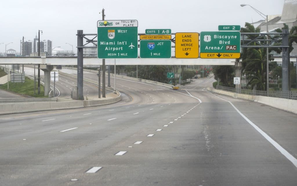 A freeway in Downtown Miami is empty as winds and rain in the outer bands of Hurricane Irma arrive in Miami, Florida, September 9, 2017. Hurricane Irma weakened slightly to a Category 4 storm early Saturday, according to the US National Hurricane Center, after making landfall hours earlier in Cuba with maximum-strength Category 5 winds. / AFP PHOTO / SAUL LOEB (Photo credit should read SAUL LOEB/AFP/Getty Images)