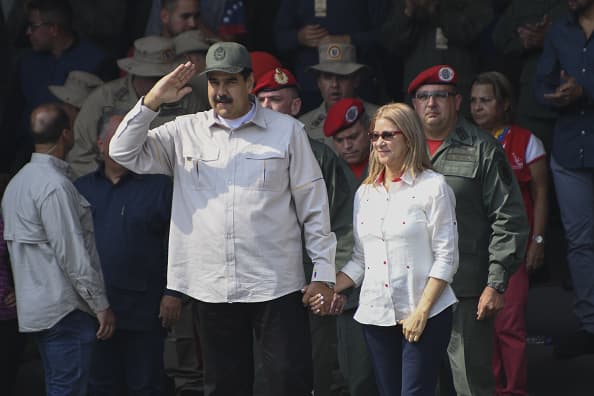 Nicolás Maduro con su esposa, Cilia Flores, en el desfile militar de Los Próceres, Caracas, el 13 de abril de 2019.