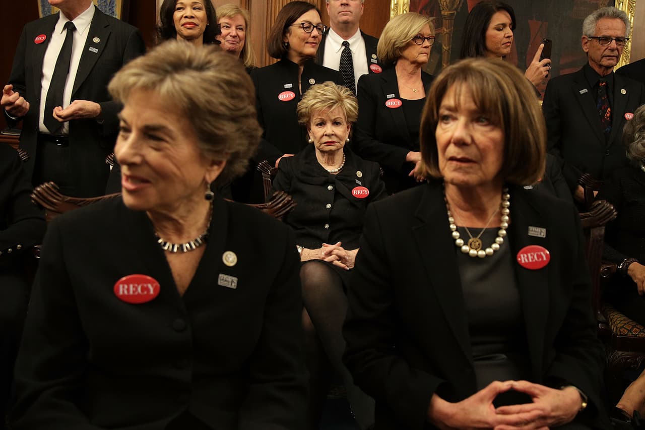 WASHINGTON, DC - JANUARY 30: (L-R) U.S. Rep. Jan Schakowsky (D-IL), Rep. Madeleine Bordallo (D-GU), Rep. Susan Davis (D-CA) and other House Democrats wear black as they participate in a photo-op at the U.S. Capitol prior to President Donald Trump's first State of the Union address January 30, 2018 in Washington, DC. House Democrats plan to show up in black when attending the State of the Union address this evening in support the #MeToo and #TimesUp movements. (Photo by Alex Wong/Getty Images)