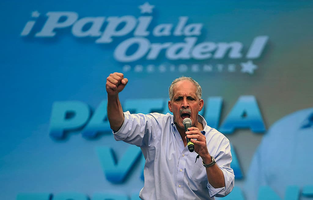 The current mayor of Tegucigalpa and presidential candidate for the ruling National party, Nasry Asfura, better known as "Papi a la Orden" (Daddy at your service), addresses supporters during a campaign rally in front of the Presidential House, in Tegucigalpa, on November 7, 2021.