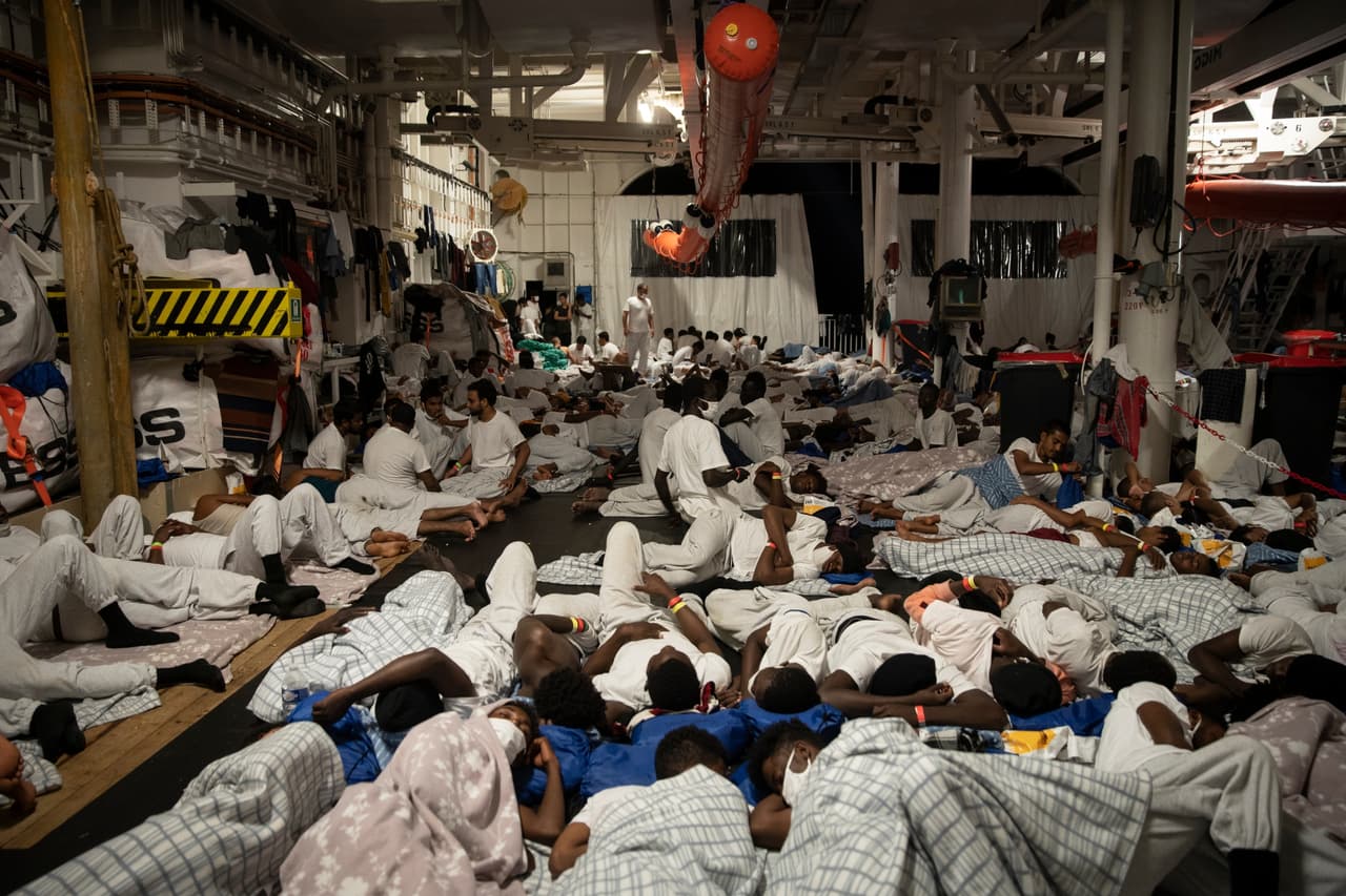 Migrants rescued off the coast of Libya sleep aboard the Geo Barents, a rescue vessel operated by Doctors Without Borders on June 14, 2021.