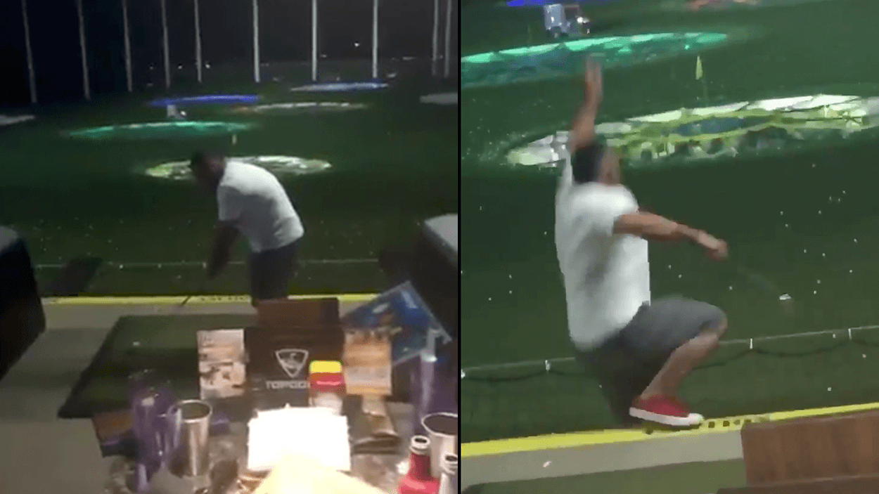 Man playing golf on multi-level golf range falls off