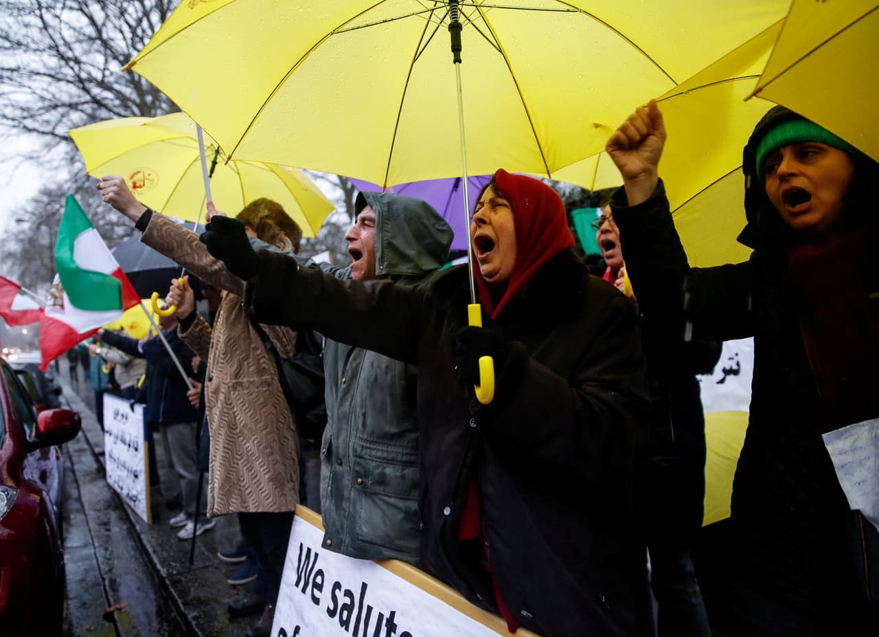 REFILE - ADDING INFORMATION Opponents of Iranian President Hassan Rouhani hold a protest outside the Iranian embassy in west London, Britain December 31, 2017. REUTERS/Eddie Keogh