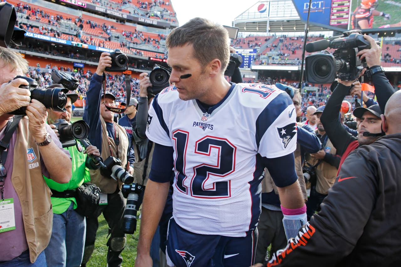 New England Patriots quarterback Tom Brady leaves the field after a 33-13 win over the Cleveland Browns in an NFL football game Sunday, Oct. 9, 2016, in Cleveland. (AP Photo/Ron Schwane)