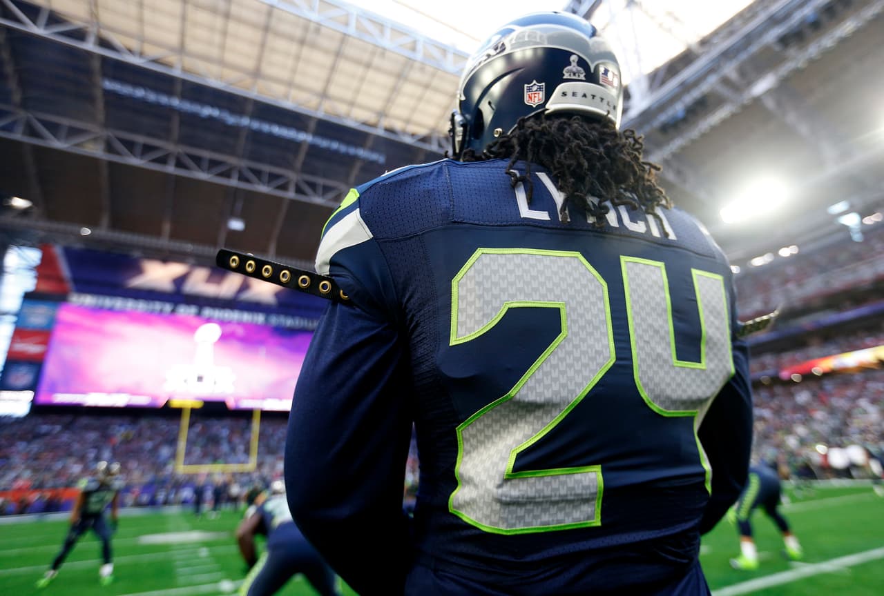 GLENDALE, AZ - FEBRUARY 01: Marshawn Lynch #24 of the Seattle Seahawks stands on the field prior to Super Bowl XLIX at University of Phoenix Stadium on February 1, 2015 in Glendale, Arizona. (Photo by Christian Petersen/Getty Images)