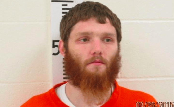 Carlton Young en la fotografía policial de su detención