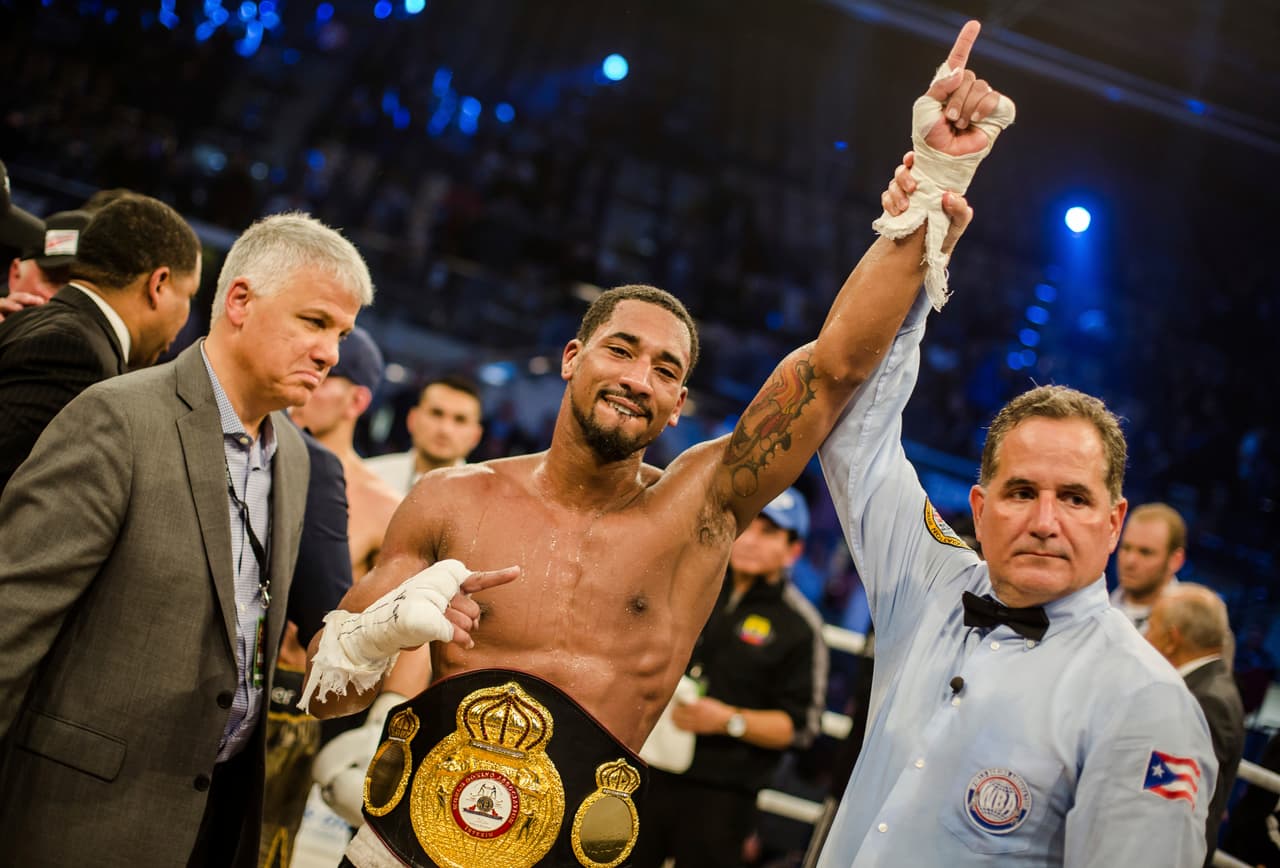 In this March 11, 2017 photo, US boxer Demetrius Andrade celebrates his victory in Ludwigshafen, Germany. Demetrius Andrade defeated Jack Culcay by split decision to take the Ecuadorian-born German's WBA super welterweight title on Saturday. (Christoph Schmidt/dpa via AP)