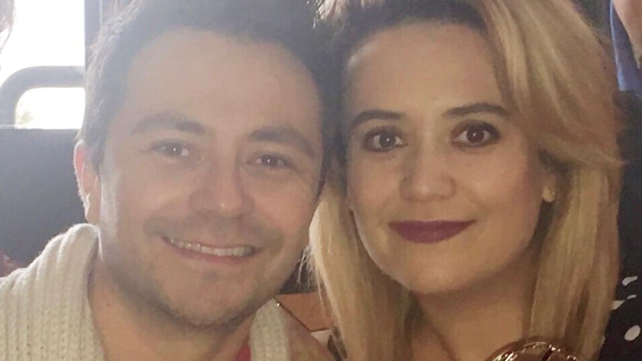 Julián Heredia, productor asociado de Univision 45, con su hermana Ana María.