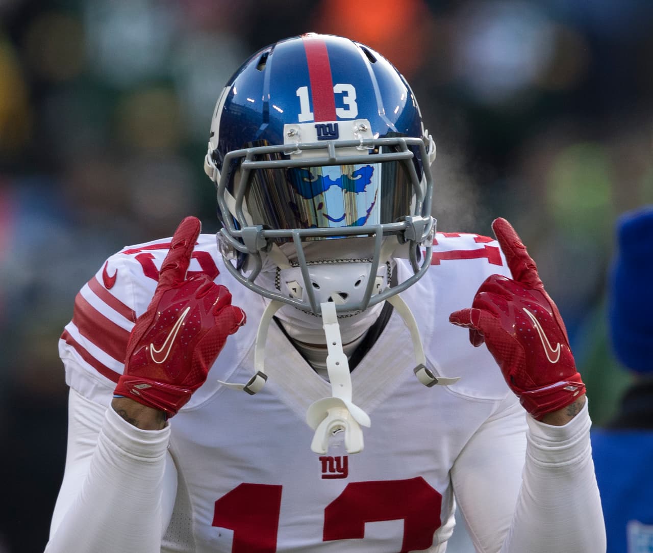 Odell Beckham Jr. warms up before an NFL football game against the Green Bay Packers on Sunday, Jan. 8, 2017, in Green Bay, Wis. (AP Photo/Jeffrey Phelps)
