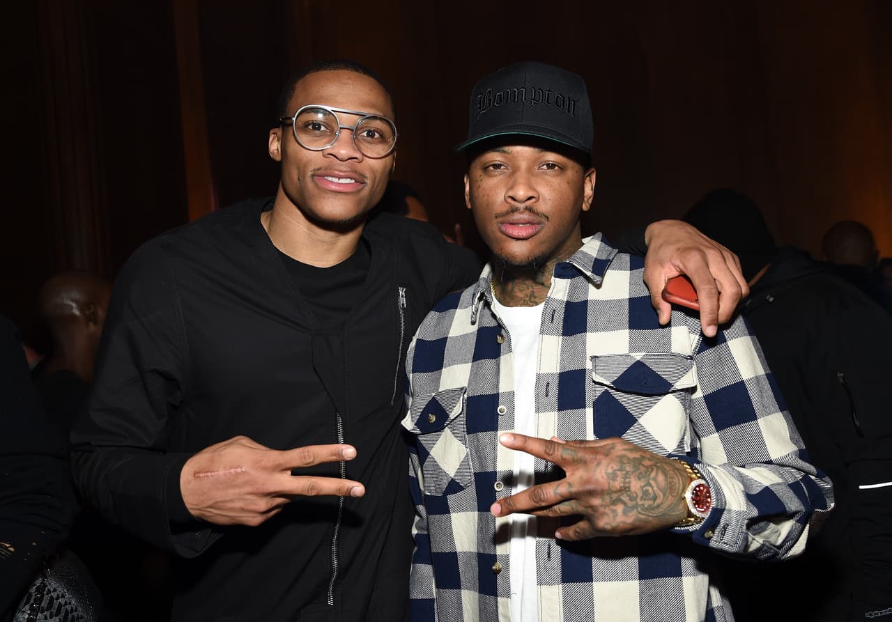 NEW YORK, NY - FEBRUARY 14: Basketball player Russell Westbrook and rapper YG attend GQ and LeBron James Celebrate All-Star Style on February 14, 2015 in New York City. (Photo by Dimitrios Kambouris/Getty Images for GQ)