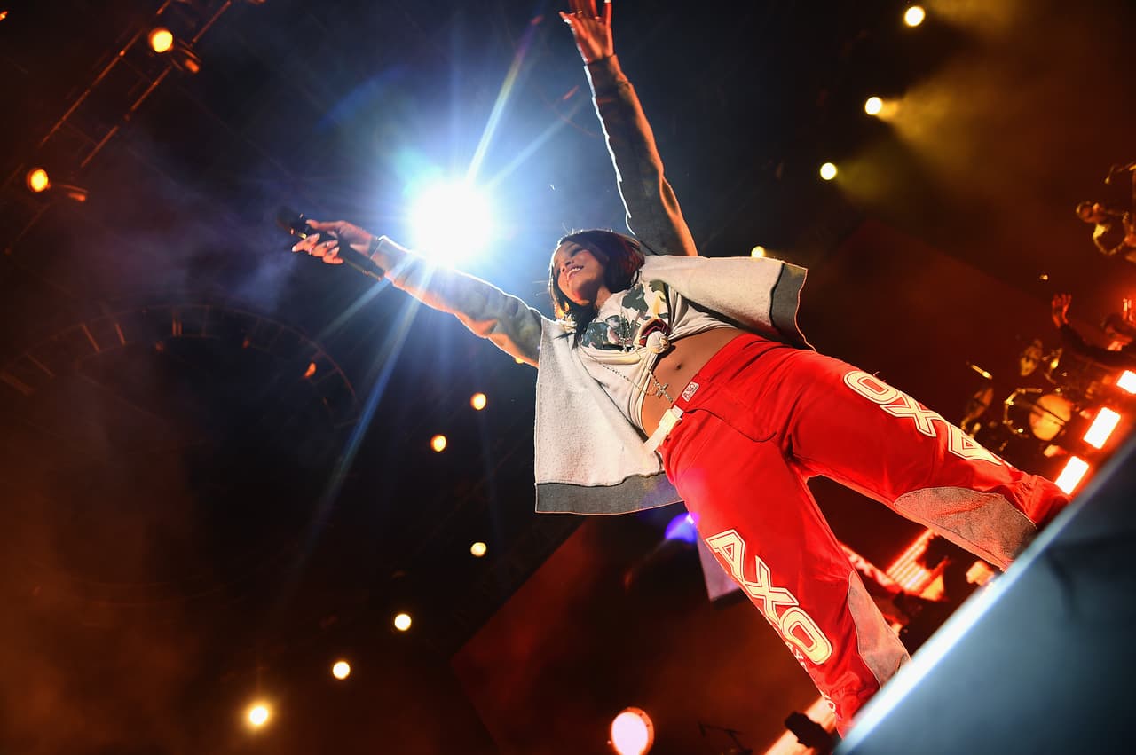 INDIANAPOLIS, IN - APRIL 04: Rihanna performs onstage during the Coke Zero Countdown at the NCAA March Madness Music Festival - Day 2 at White River State Park on April 4, 2015 in Indianapolis, Indiana. (Photo by Michael Loccisano/Getty Images for Turner)