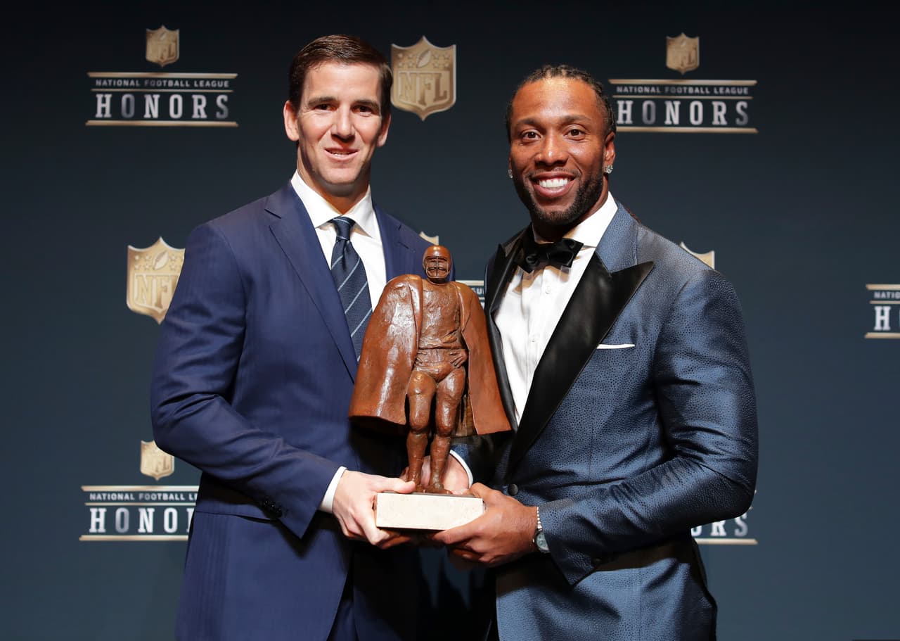 Walter Payton NFL Man of the Year: 
<a href="http://www.nfl.com/player/elimanning/2505996/profile">Eli Manning</a>, New York Giants; 
<a href="http://www.nfl.com/player/larryfitzgerald/2506106/profile">Larry Fitzgerald</a>, Arizona Cardinals