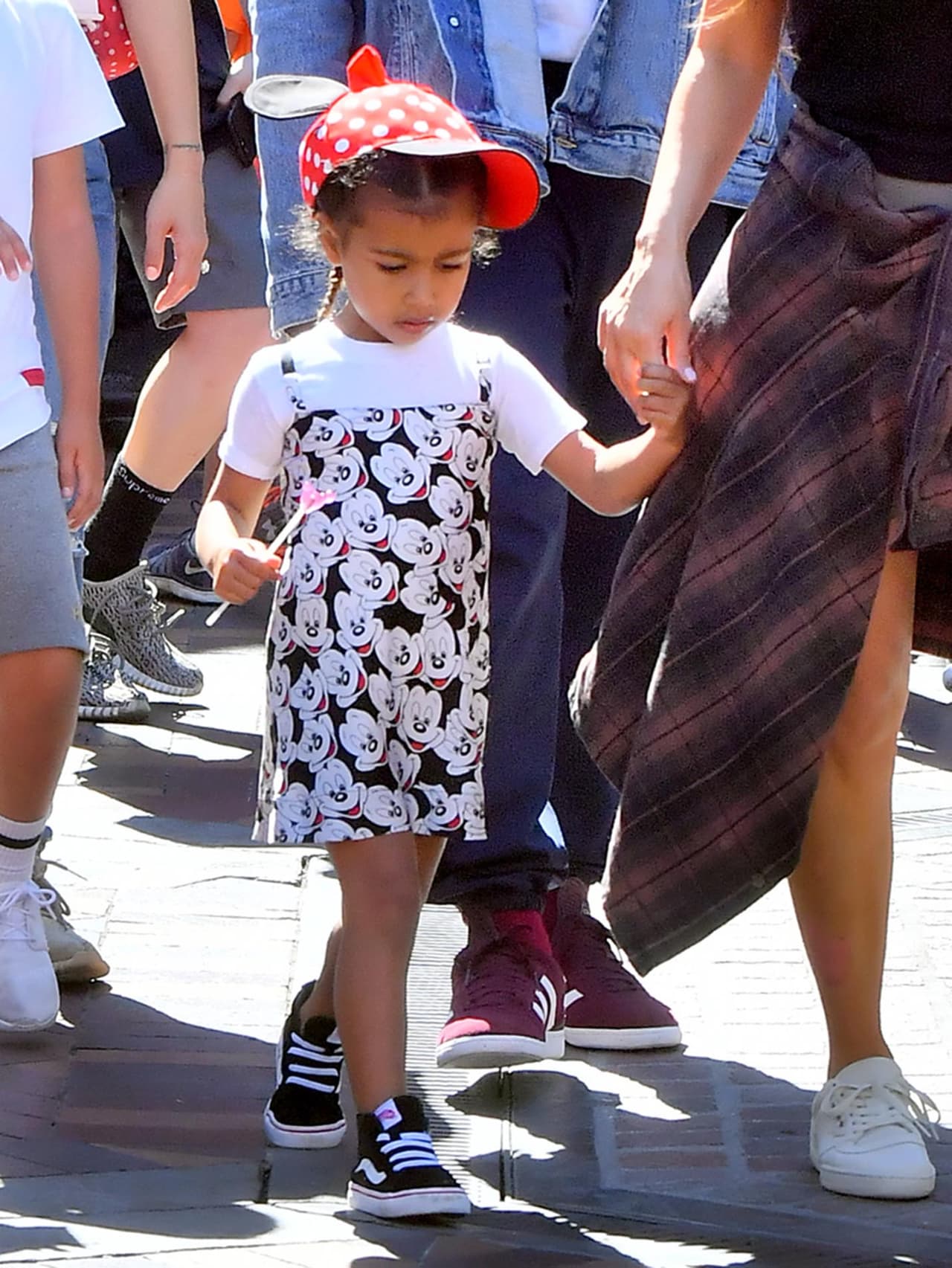 Photo © 2017 Splash News/The Grosby Group EXCLUSIVE Los Angeles, May 23, 2017. Kim Kardashian and Kanye West take their daughter and niece to the happiest place on earth, Disneyland. The group, joined by friends, were seen riding many rides including the teacups, Dumbo, Its a Small World, the gadget go coaster and many other rides on their trip. Kanye even cracked a smile on thunder mountain,
