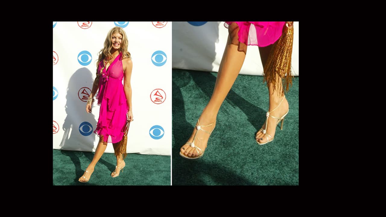 Otra que nos sorprendió fue Fergie, quien no descuidó ni un detalle para desfilar como toda una princesa en la alfombra de Latin GRAMMY en 2004.