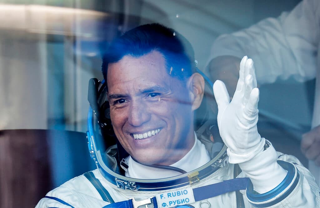 NASA astronaut Frank Rubio, member of the main crew of the expedition to the International Space Station (ISS), waves to his relatives for a bus prior the launch of Soyuz MS-22 space ship at the Russian leased Baikonur cosmodrome, Kazakhstan, Wednesday, Sept. 21, 2022. (Maxim Shemetov, Pool Photo via AP)