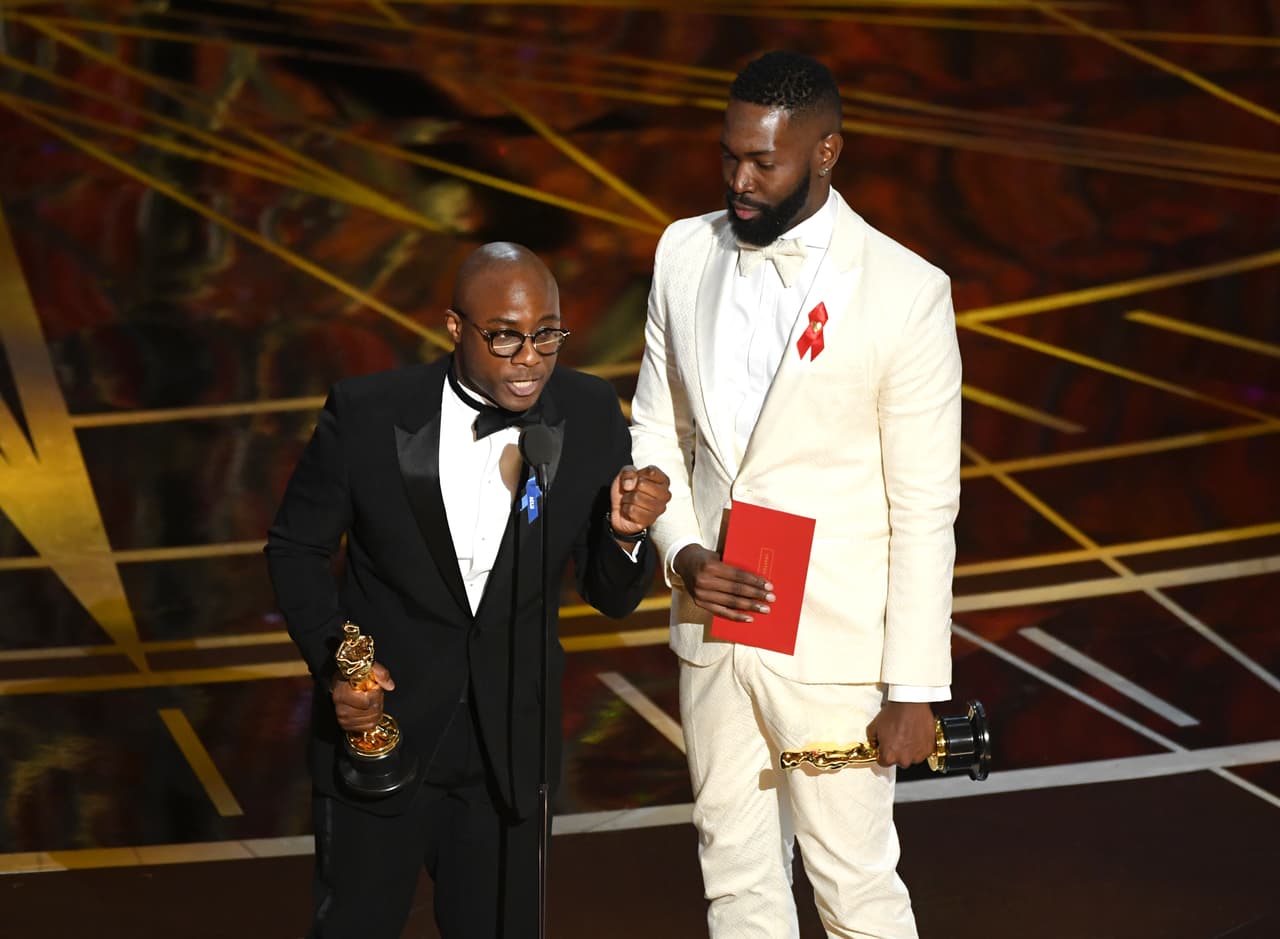 HOLLYWOOD, CA - FEBRUARY 26: Writer/director Barry Jenkins (L) and writer Tarell Alvin McCraney accept Best Adapted Screenplay for 'Moonlight' onstage during the 89th Annual Academy Awards at Hollywood & Highland Center on February 26, 2017 in Hollywood, California. (Photo by Kevin Winter/Getty Images)