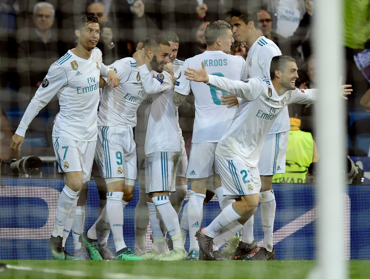 Real Madrid's French forward Karim Benzema (2L) celebrates a goal with teammates during the UEFA Champions League semi-final second leg football match between Real Madrid and Bayern Munich at the Santiago Bernabeu Stadium in Madrid on May 1, 2018. (Photo by JAVIER SORIANO / AFP) (Photo credit should read JAVIER SORIANO/AFP/Getty Images)