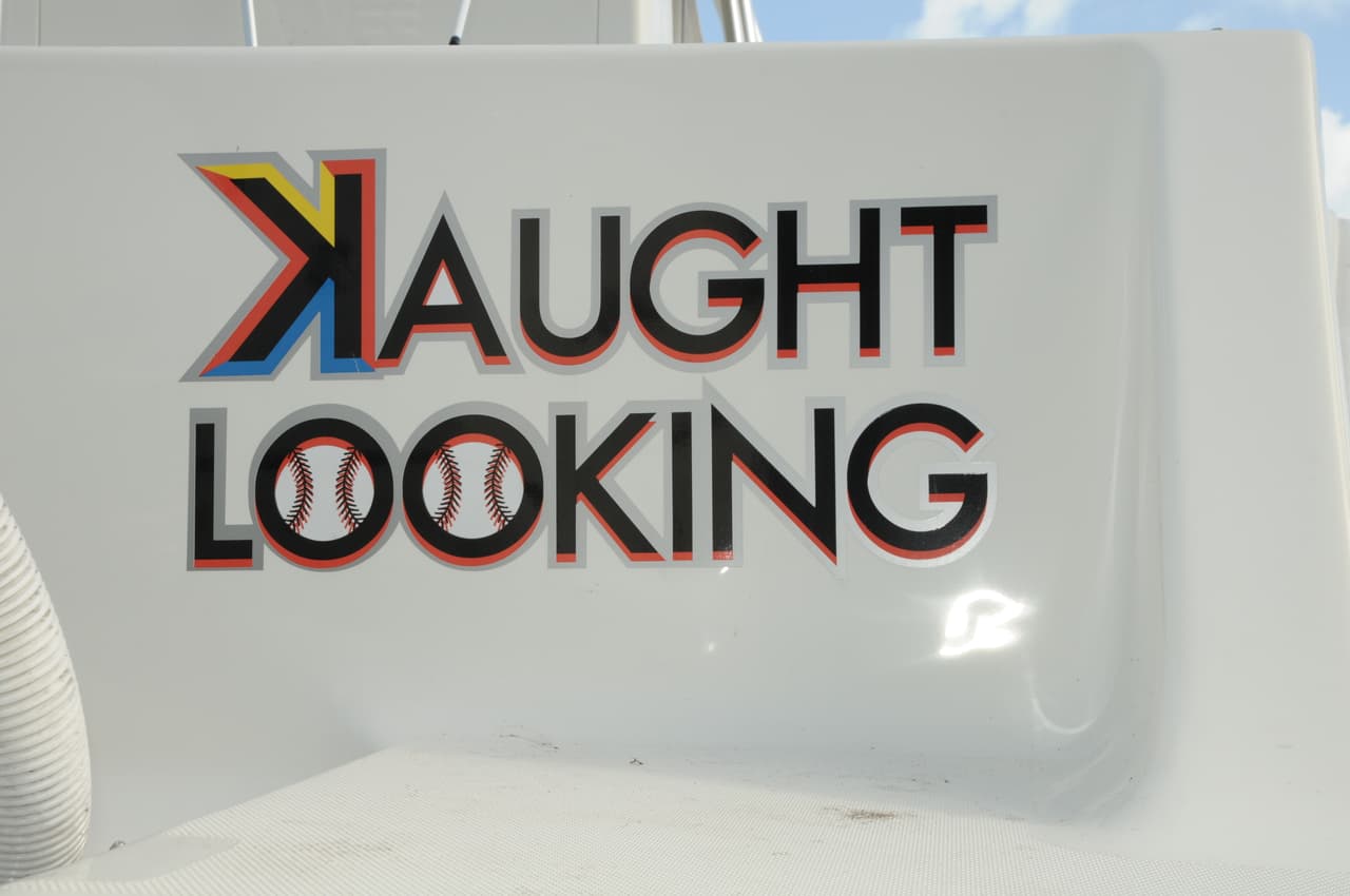 The boat was named 
<i>Kaught Looking, </i>a baseball expression when a batter is struck out without swinging at a pitch.
