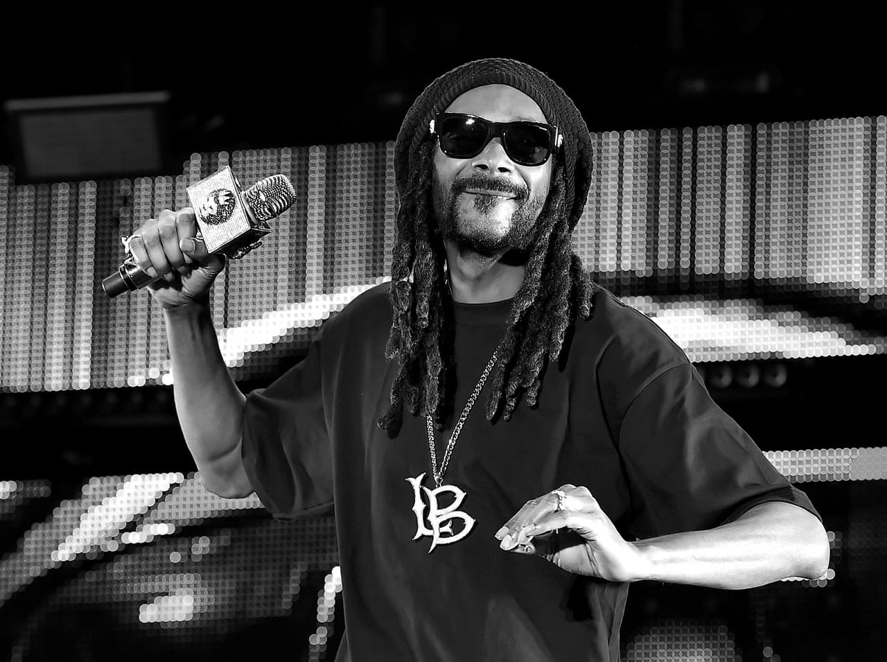 INDIO, CA - APRIL 29: (EDITORS NOTE: Image has been converted to black and white.) Recording artist Snoop Dogg performs with singer Sam Hunt onstage during 2016 Stagecoach California's Country Music Festival at Empire Polo Club on April 29, 2016 in Indio, California. (Photo by Kevin Winter/Getty Images for Stagecoach)