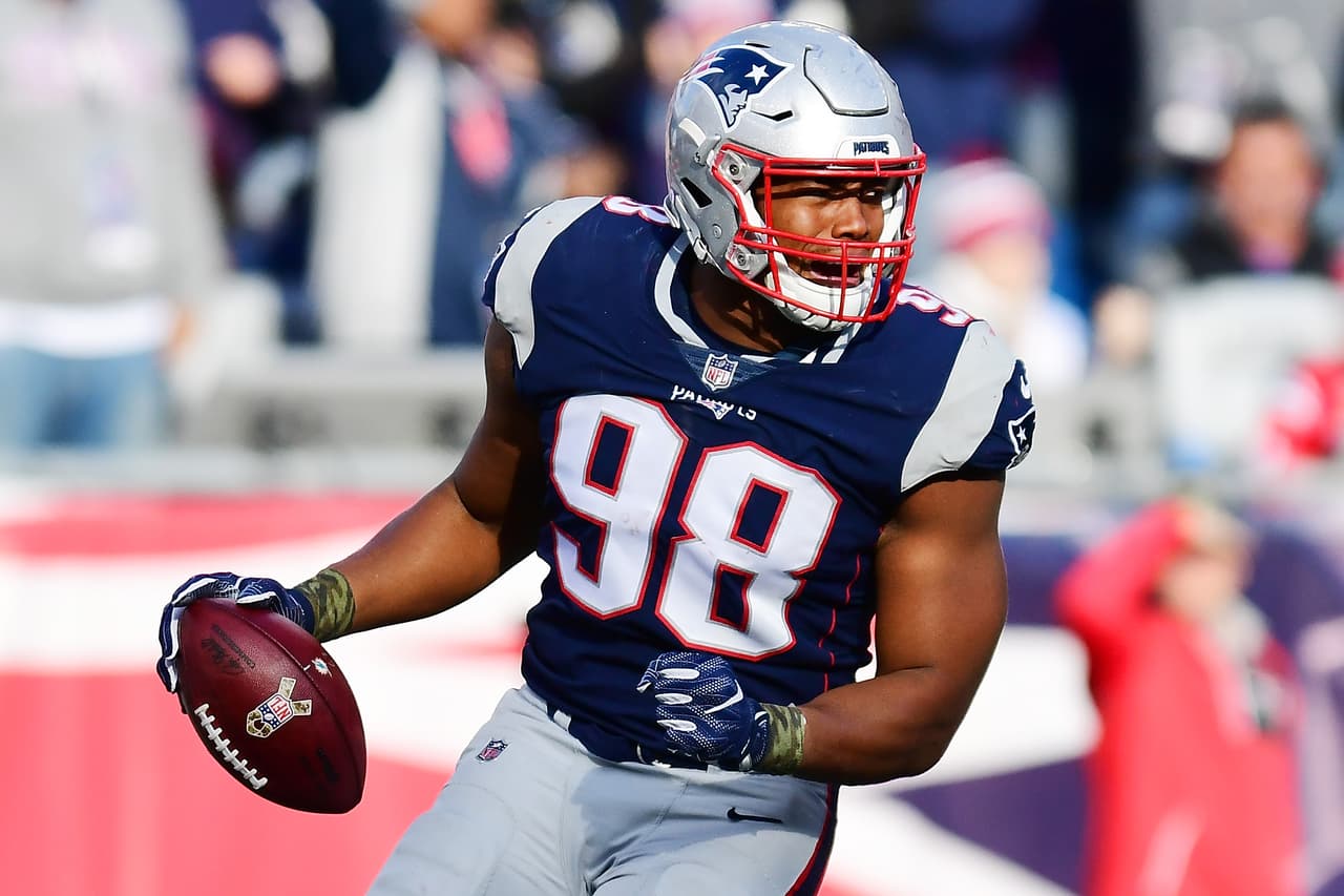 Trey Flowers #98 of the New England Patriots reacts during a game against the Miami Dolphins at Gillette Stadium on November 26, 2017 in Foxboro, Massachusetts.