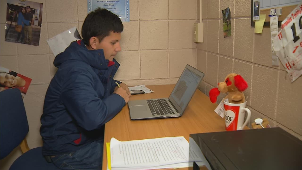 José Reza studies in his college dorm in Iola, Kansas.