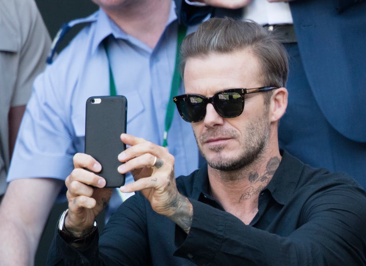 El ex futbolista hasta le tomó foto al partido.