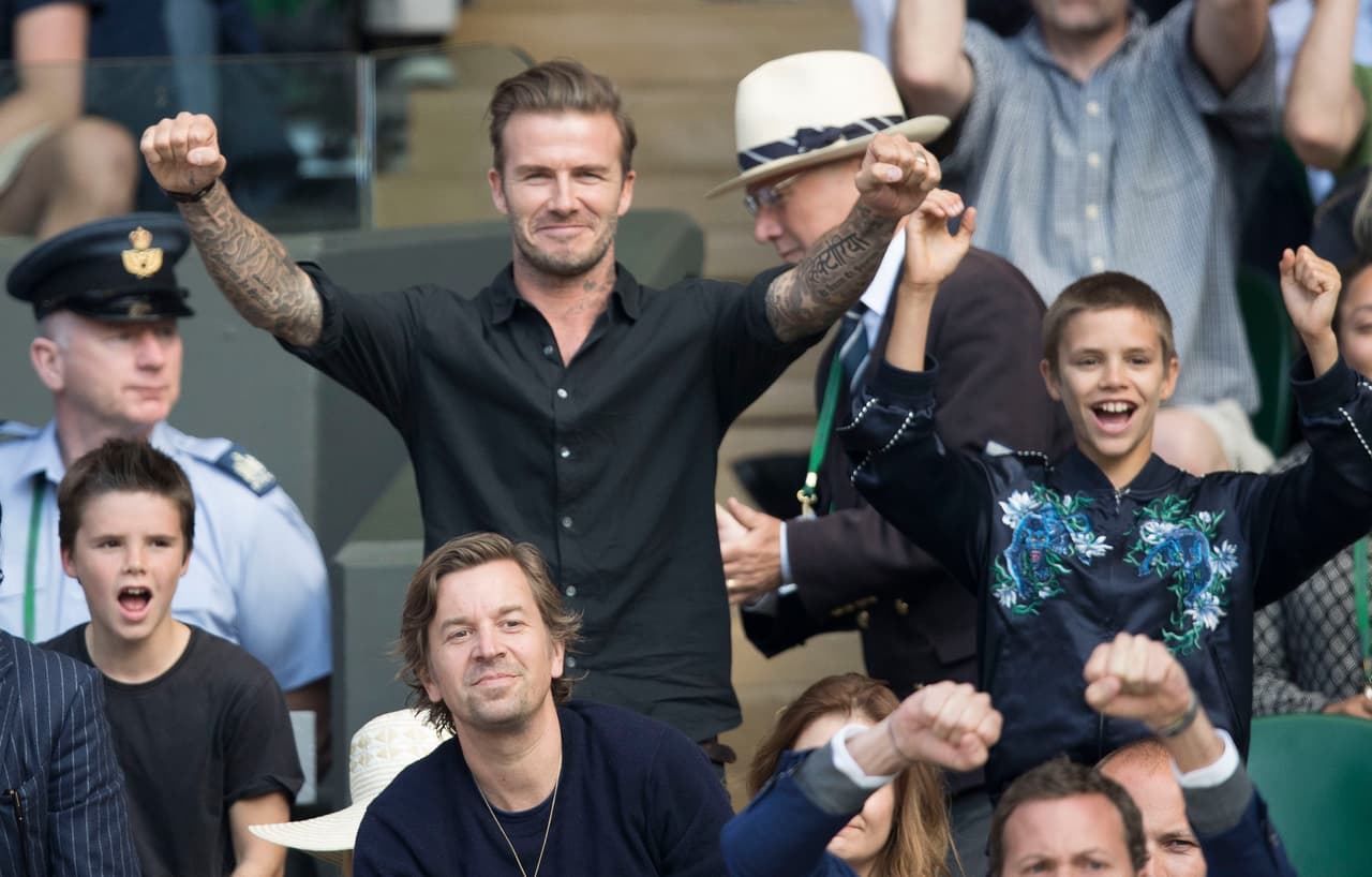 David Beckham festejó el punto de Federer.