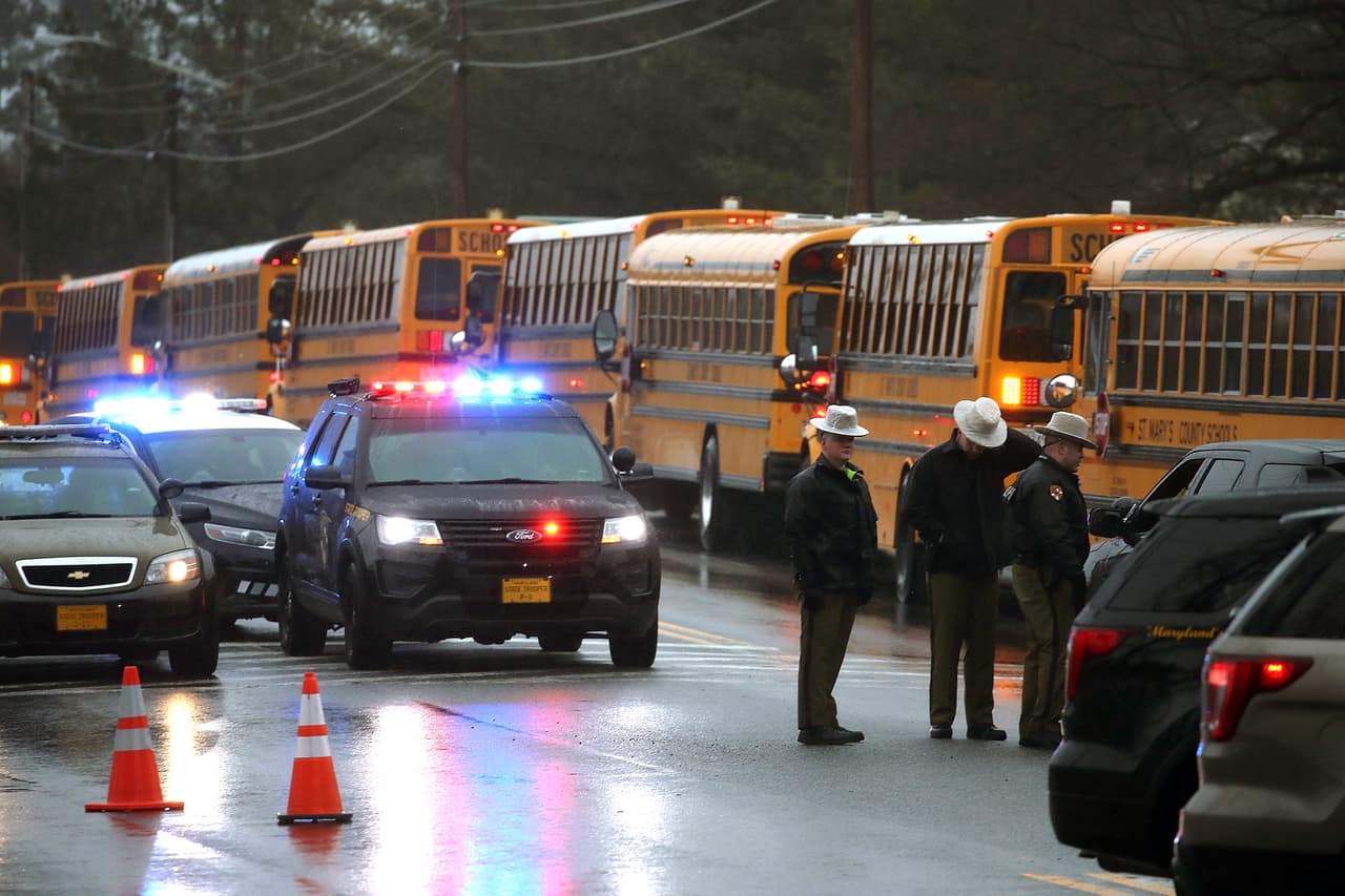 GREAT MILLS, MD - MARCH 20: School buses are lined up in front of Great Mills High School after a shooting on March 20, 2018 in Great Mills, Maryland. It was reported that two students at a Maryland high school were injured after a colleague opened fire in the hallway just before classes began. (Photo by Mark Wilson/Getty Images)