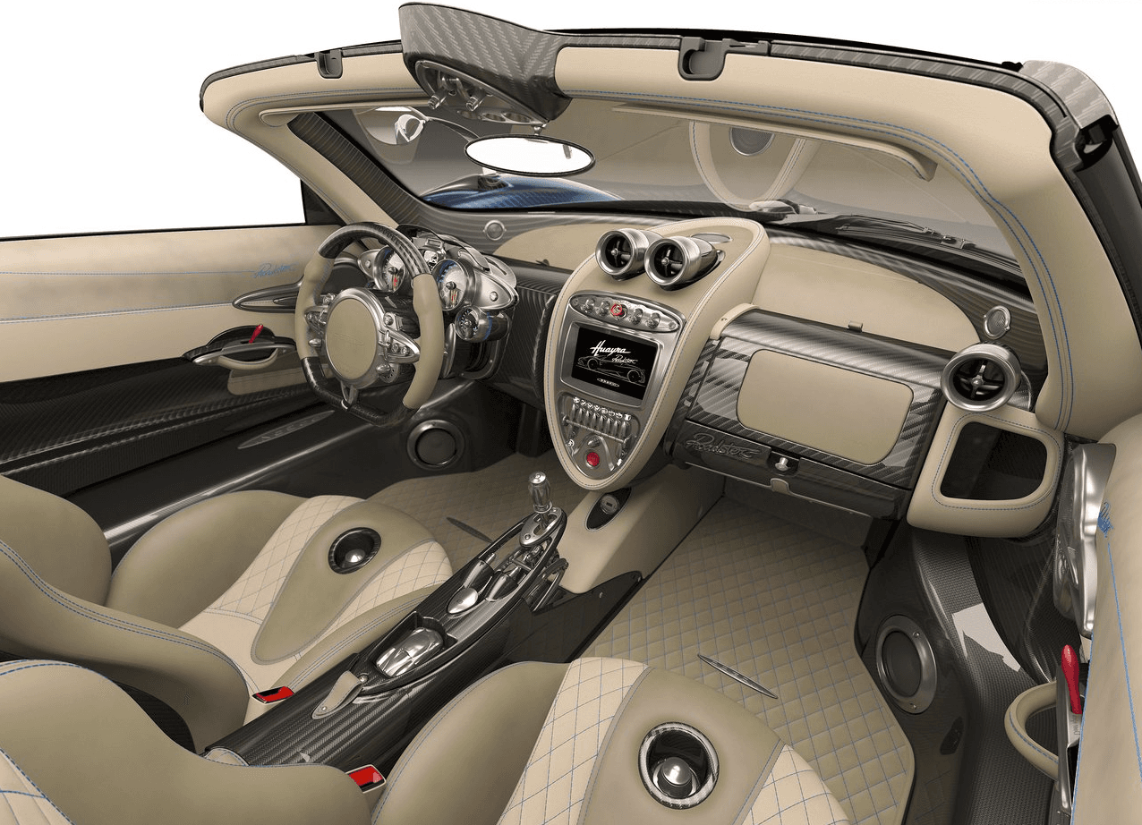 El interior del Huayra Roadster fue especialmente trabajado, predominan las formas circulares, sobre todo en las salidas de aire, y el cuero en los asientos e instrumental.