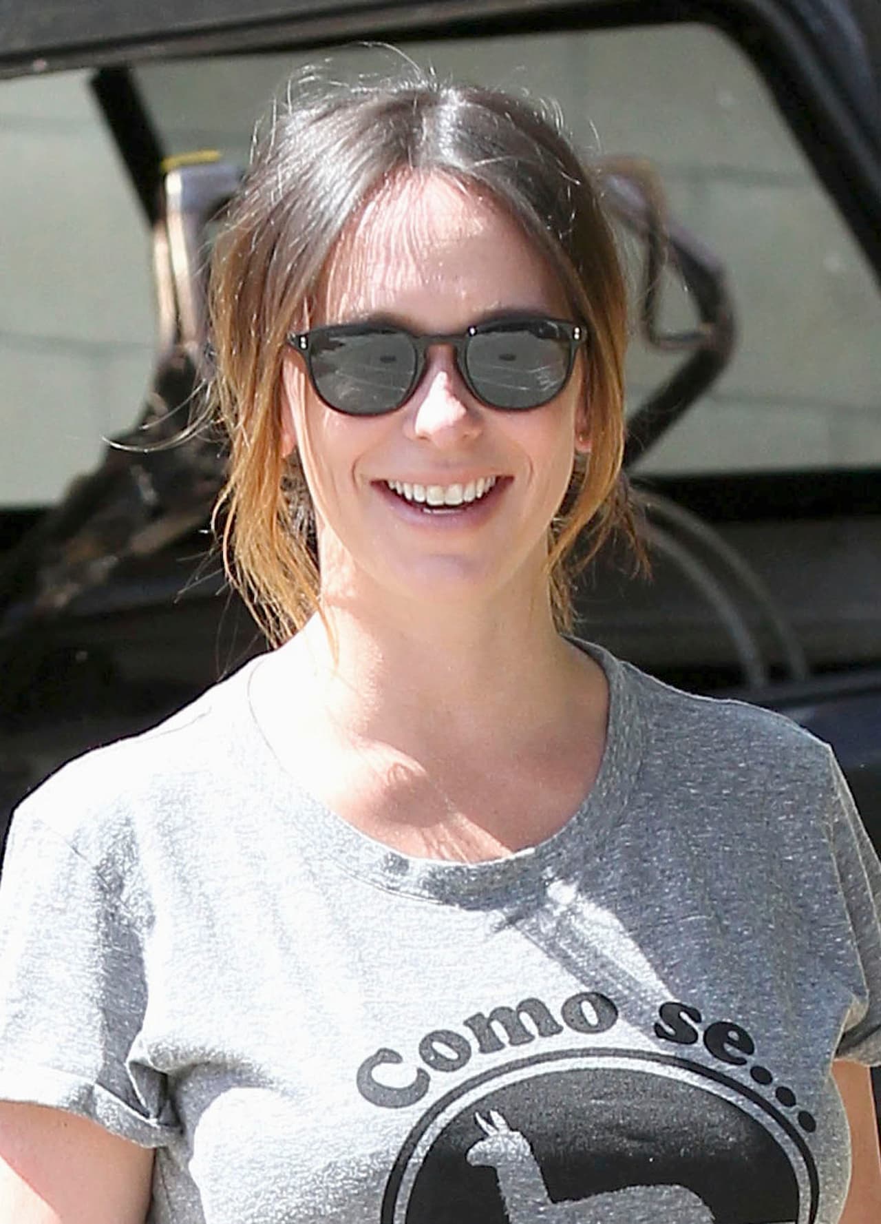 Muy sonriente para las cámaras.