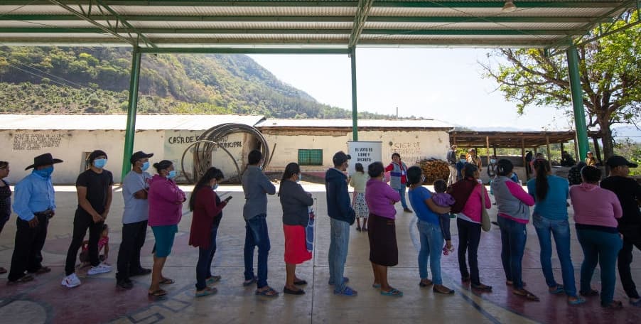 Voters line up for their turn to cast their ballots at a polling station on June 06, 2021 in Ayahualtempa, Mexico.