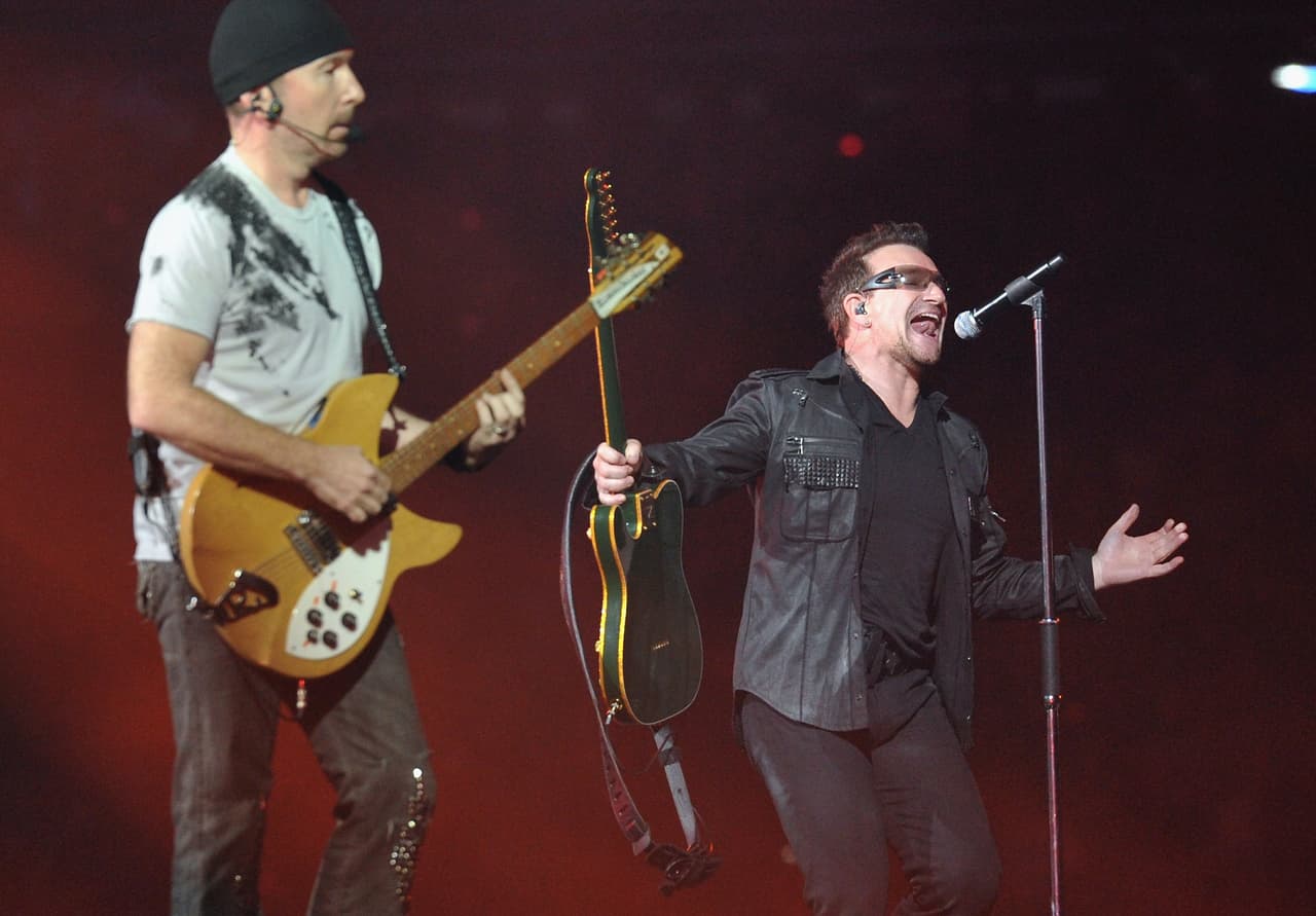 EAST RUTHERFORD, NJ - JULY 20: U2 guitar player The Edge (L) and lead singer Bono perform at the New Meadowlands Stadium on July 20, 2011 in East Rutherford, New Jersey.