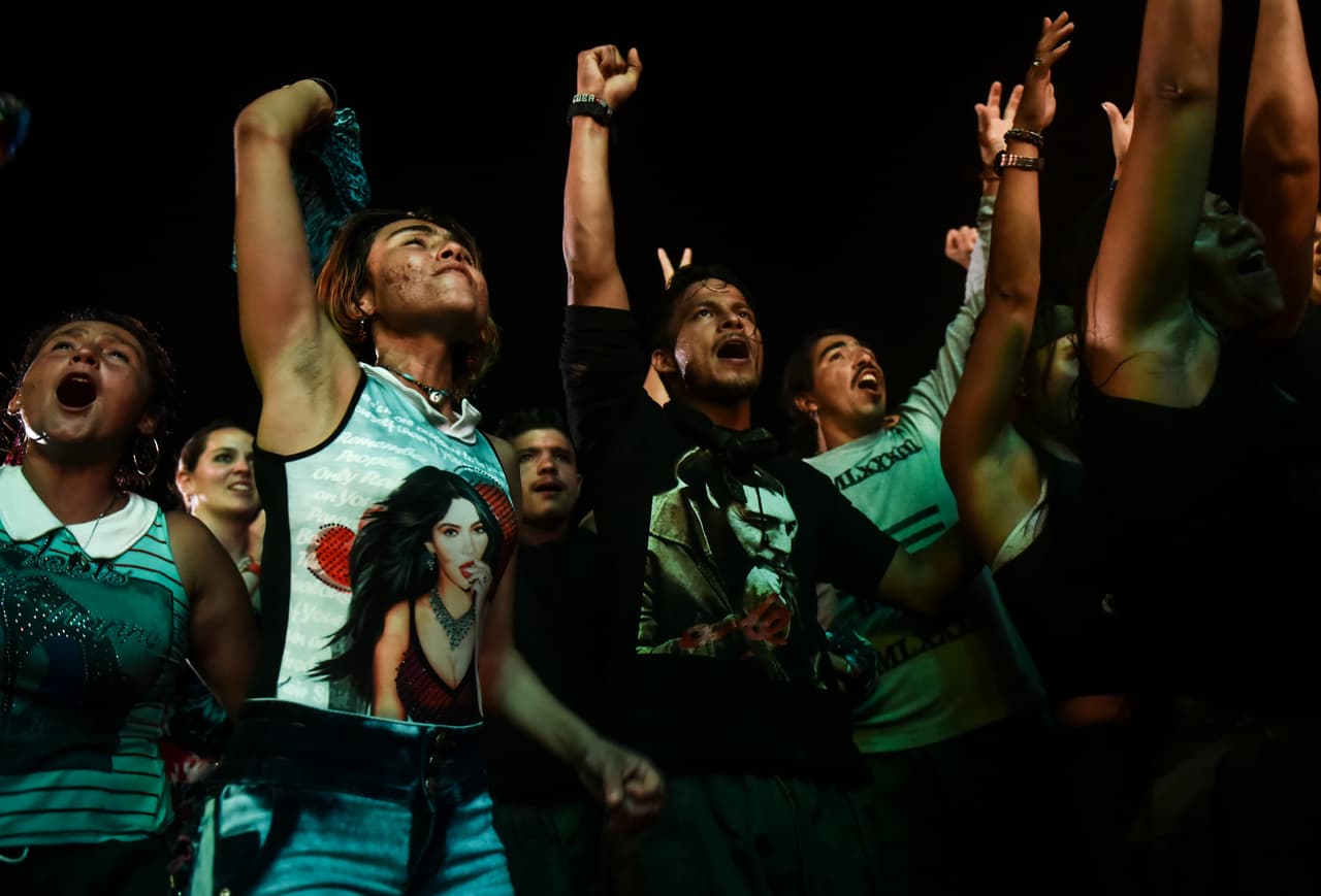 FARC members cheer as they attend a cultural event during the 10th National Guerrilla Conference in Llanos del Yari, Colombia.