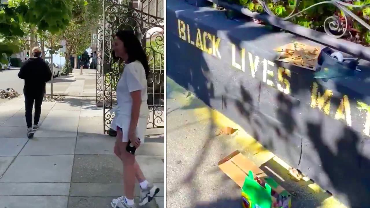 Mujer reclama a una "persona de color" por pintar un letrero con tiza en un muro y se lleva una lección