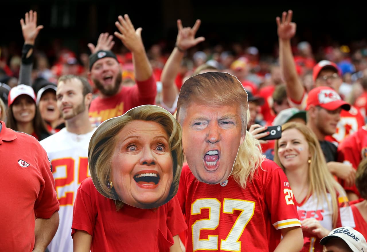 KANSAS CITY, MO - SEPTEMBER 25: Kansas City Chiefs fans wear Hillary Clinton and Donald Trump masks during the game bethween the Chiefs and the New York Jets at Arrowhead Stadium on September 25, 2016 in Kansas City, Missouri. (Photo by Jamie Squire/Getty Images)