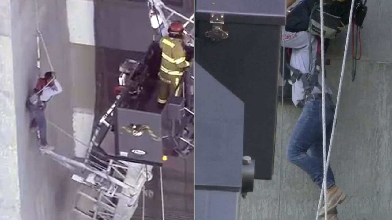 Así fue el dramático rescate de dos trabajadores que quedaron colgando de un edificio