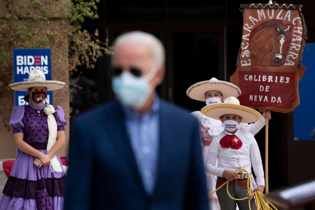 Supporters wait to hear Democratic presidential candidate Joe Biden speak at the East Las Vegas Cominity Center about the effects of Covid-19 on Latinos, October 9, 2020, in Las Vegas, Nevada.