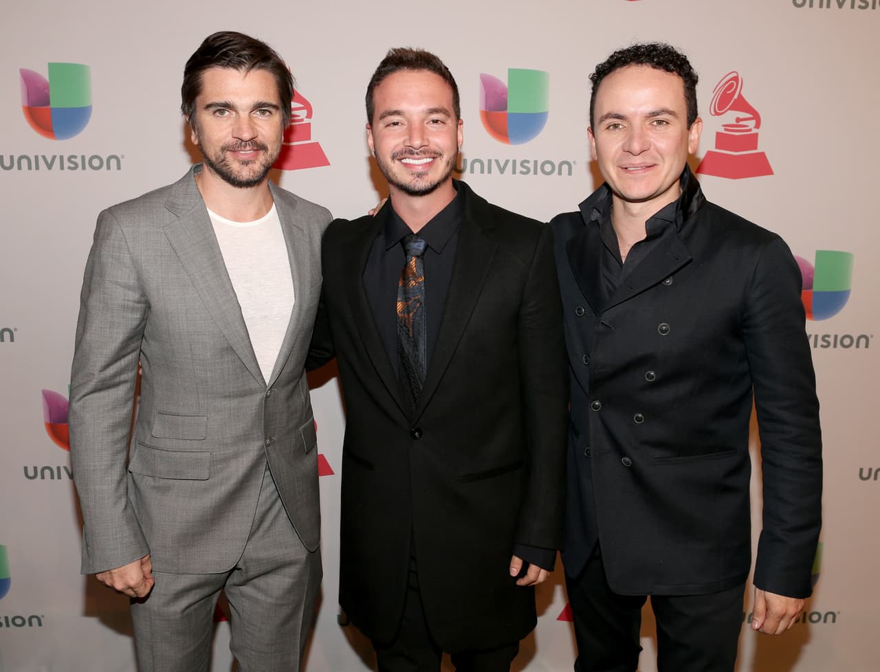 (L-R) Singers Juanes, J Balvin and Fonseca pose for a photo at the Latin GRAMMY Awards at the MGM Grand Garden Arena on November 20, 2014 in Las Vegas, Nevada.