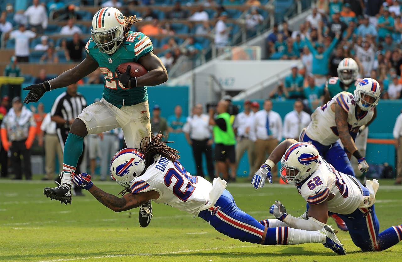 MIAMI GARDENS, FL - OCTOBER 23: Jay Ajayi #23 of the Miami Dolphins rushes during a game against the Buffalo Bills at Hard Rock Stadium on October 23, 2016 in Miami Gardens, Florida. (Photo by Mike Ehrmann/Getty Images)