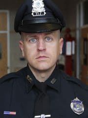 Oficial de policía Michael C. Chesna.