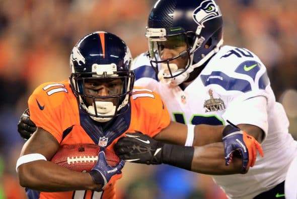 Los Seahawks, con un fútbol "total", el que había trabajado el entrenador del equipo durante toda la temporada regular, el veterano Pete Carroll, derrotaron por paliza de 43-8 a los Broncos, la mejor ofensiva de liga, con el mariscal de campo Peyton Manning a la cabeza. No habían pasado ni 12 segundos desde el comienzo del partido y los Seahawks ya hicieron historia con la anotación más rápida que se había dado jamás en un Super Bowl. Pero lo peor no fue el dejarse anotar dos puntos, sino la imagen de enfrentamiento entre Manning y el centro de origen mexicano Manny Ramírez, que no le dio bien al balón, y aunque el corredor Knowshon Moreno lo recuperó, lo hizo en la zona de protección. La mejor ofensiva de la NFL estaba paralizada, sin saber qué hacer, y ahí fue el comienzo y el final del partido disputado en el MetLife Stadium, de East Rutherford (Nueva Jersey), donde la temperatura fue de 43 grados. Malcom Smith recibió el premio de Jugador Más Valioso (MVP), el octavo defensor que lo consigue en un partido de Super Bowl y el tercer apoyador. Carroll, de 61 años, el tercer entrenador con más edad de la NFL que ganó un Super Bowl, se convirtió en el tercer entrenador que logra los dos títulos de campeón universitario de la NCAA con el equipo de USC y ahora los Seahawks en la NFL.