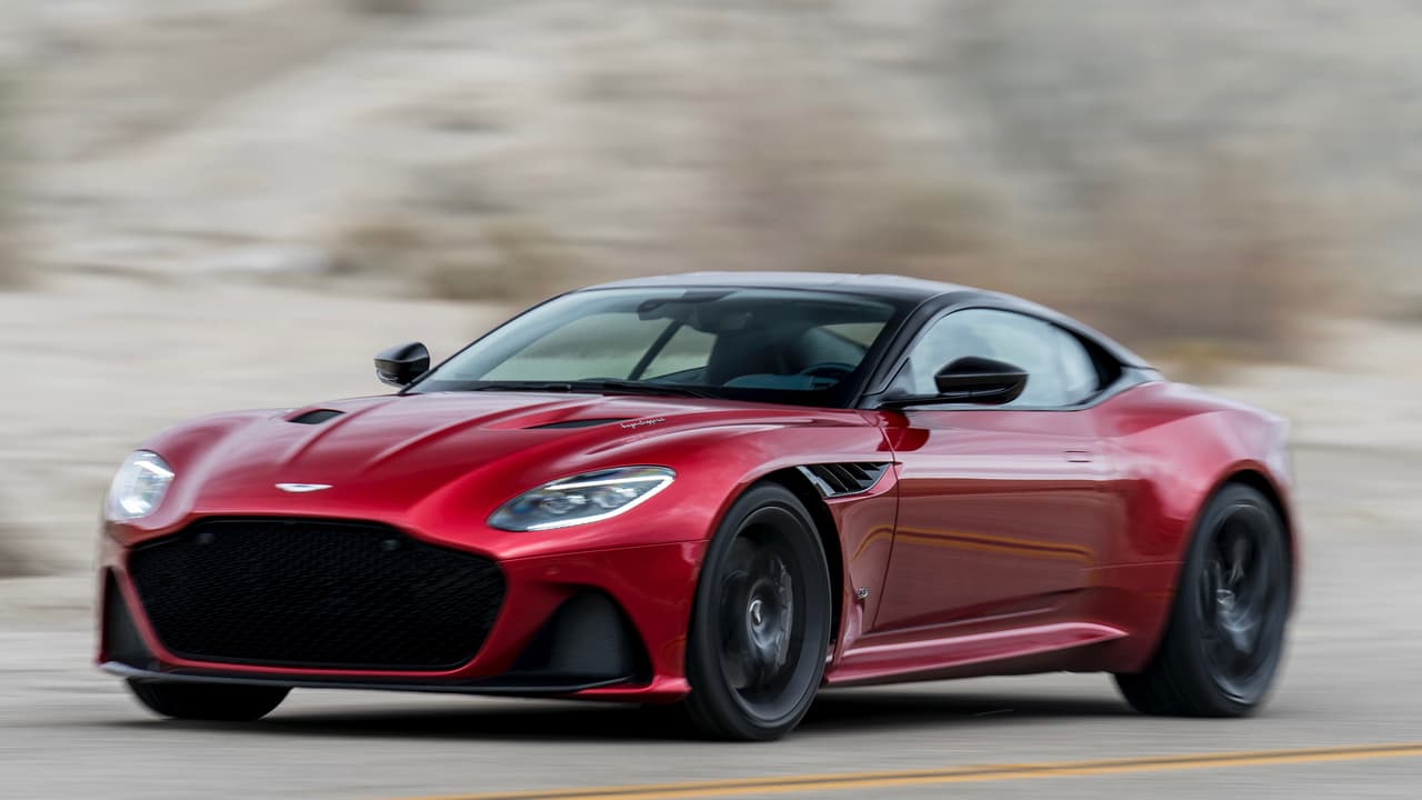 Aston Martin usó por primera vez el nombre DBS hace 50 años en otro Gran Turismo comercializado entre 1967 y 1972 al cual se le acredita por haber mantenido al fabricante vivo durante una de sus épocas más difíciles. El nombre DBS regreso para identificar al un súper GT construido entre 2007 y 2012. A diferencia del DBS original que uso motores de 6 cilindros en línea y V8, el nuevo DBS estuvo motorizado únicamente por un V12 de 5.9 litros.