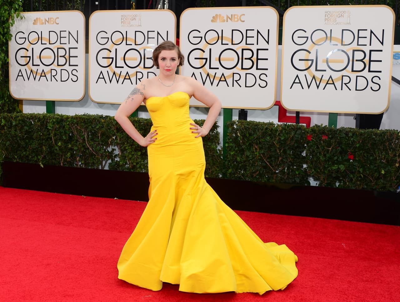Y si Disney quisiera aventurarse a que su princesa no luciera tan tradicional y con una silueta tan típica de princesa, sino que fuera una verdadera princesa que reivindique la belleza real, Lena Dunham, con su vestido amarillo incandescente que usó en los Golden Globe 2015 sería, sin duda, el modelo a seguir.