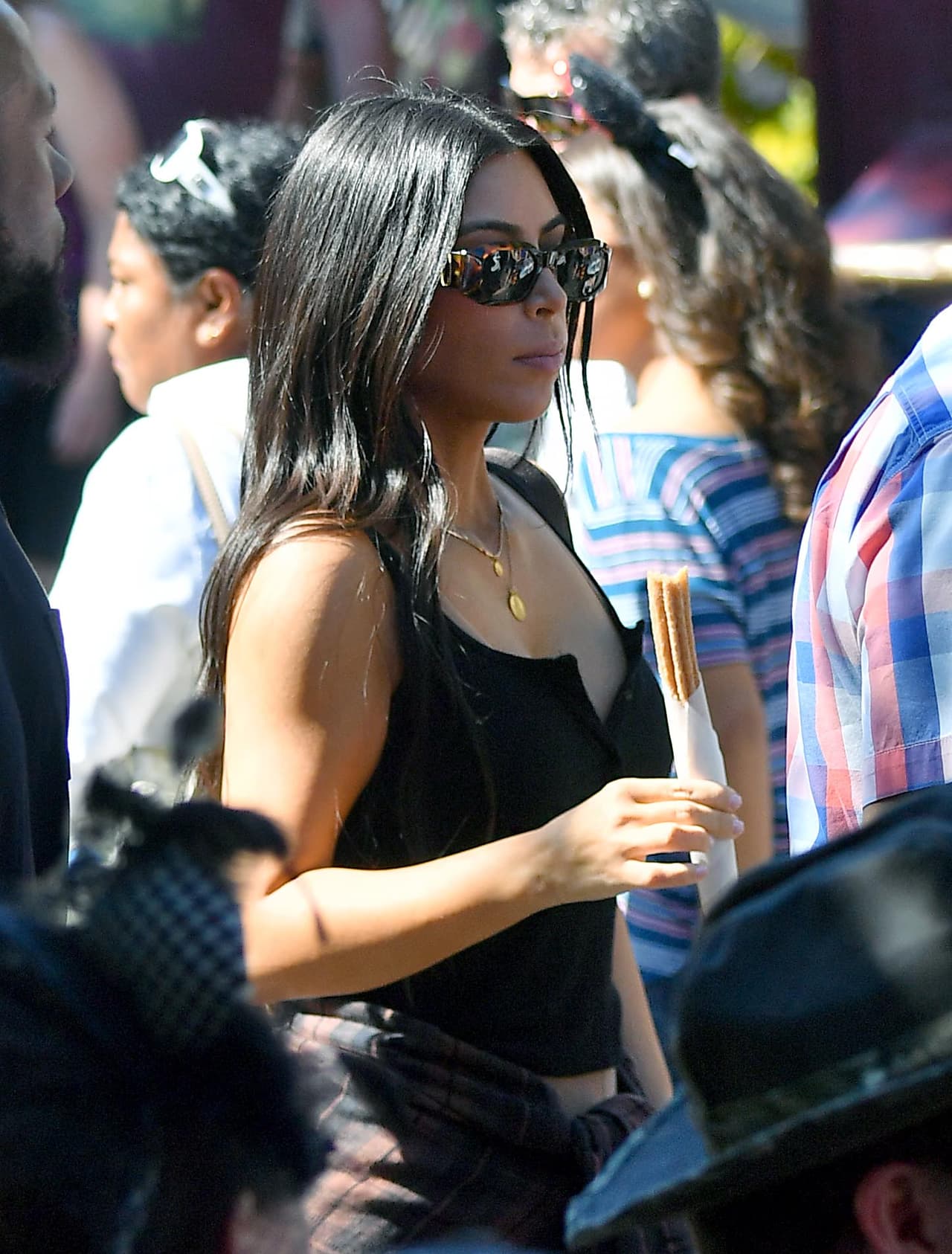 Photo © 2017 Splash News/The Grosby Group EXCLUSIVE Los Angeles, May 23, 2017. Kim Kardashian and Kanye West take their daughter and niece to the happiest place on earth, Disneyland. The group, joined by friends, were seen riding many rides including the teacups, Dumbo, Its a Small World, the gadget go coaster and many other rides on their trip. Kanye even cracked a smile on thunder mountain,